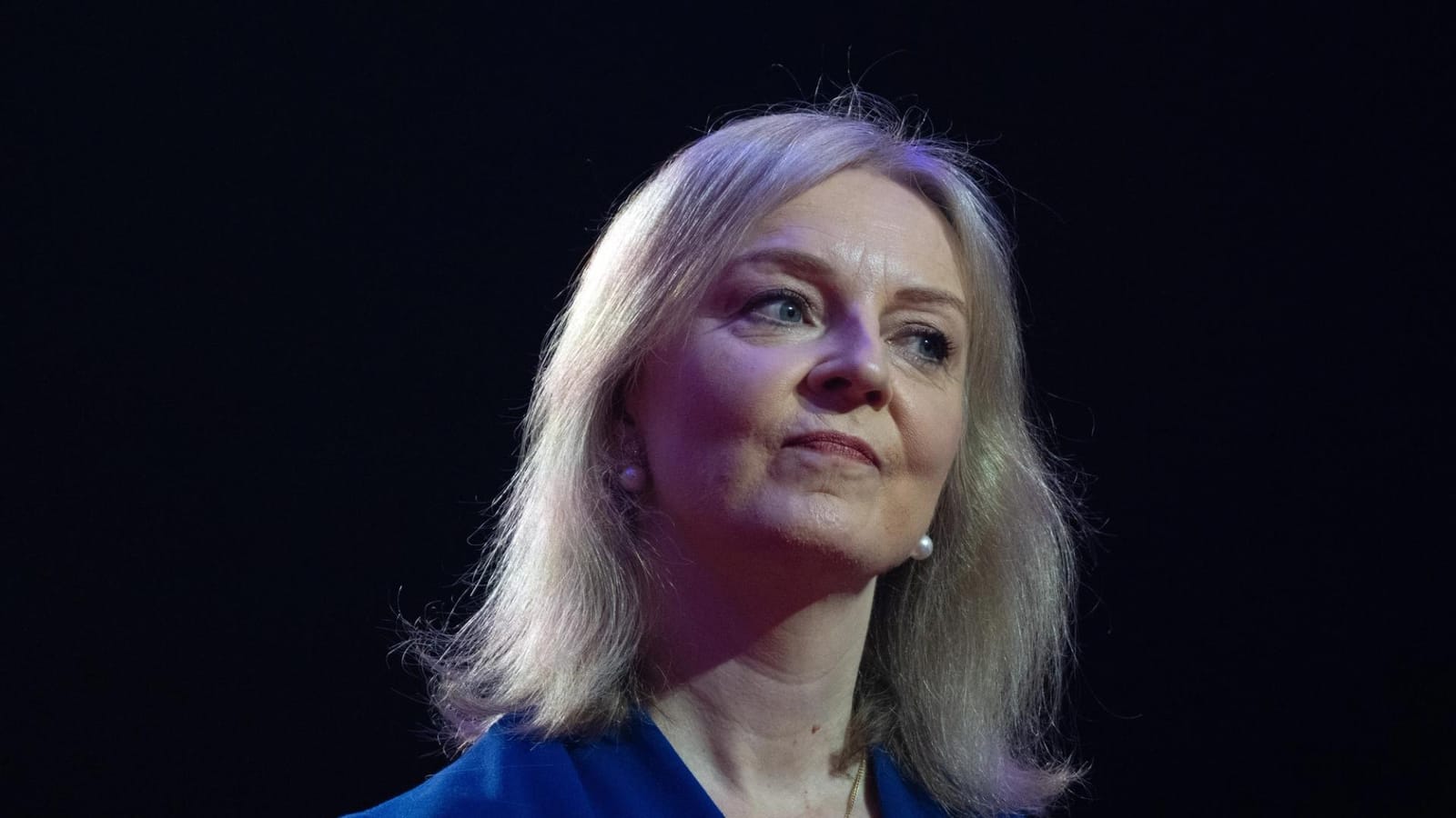 Liz Truss Warns Bond Rout May Trigger UK Emergency Spending Cuts